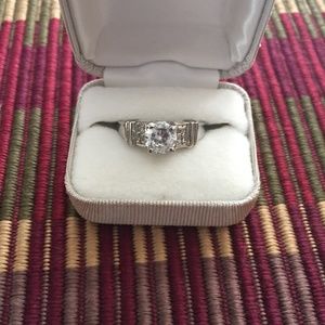 Silver tone cubic zirconia.  Size 7.25